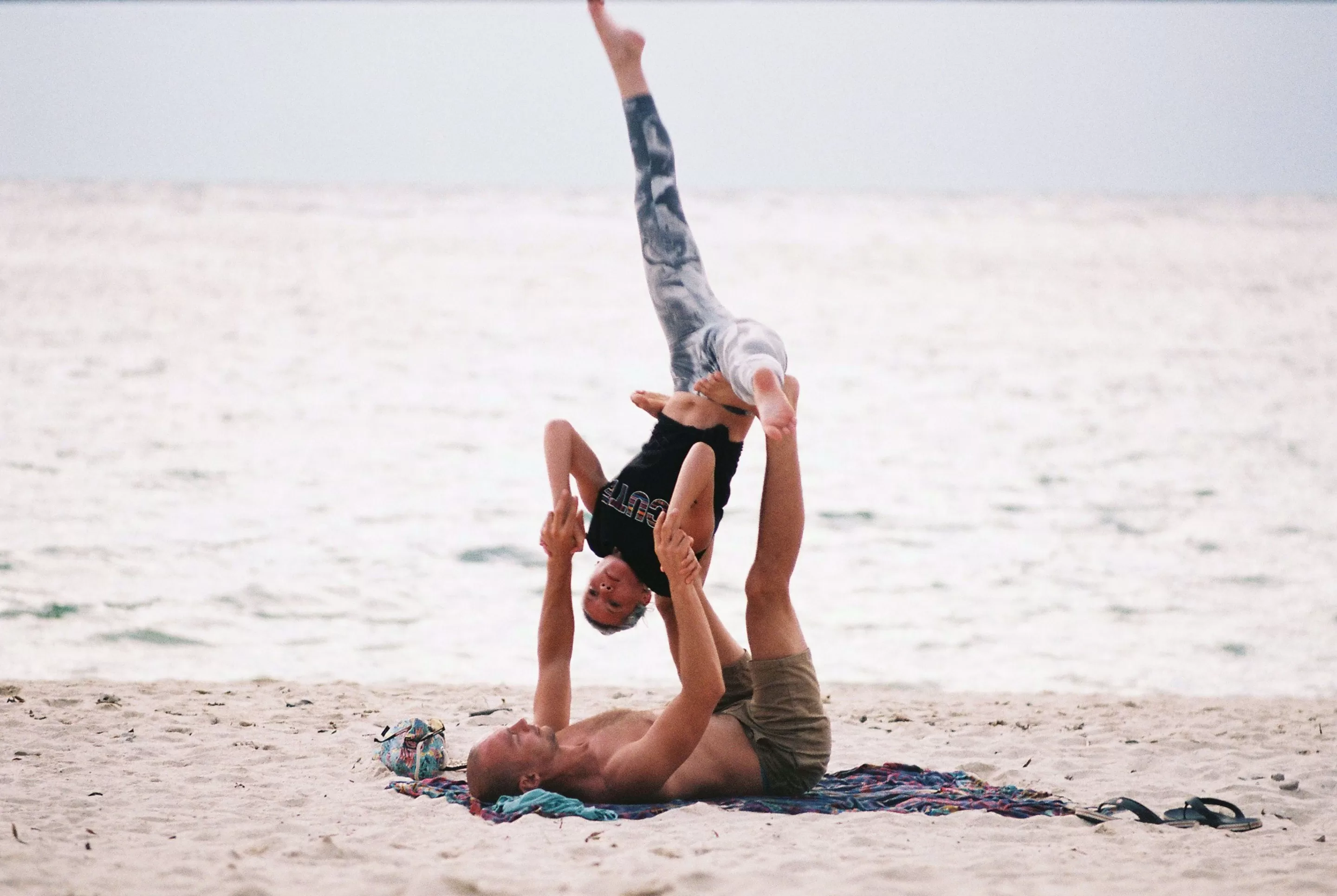 5 AcroYoga Poses for a Stronger Relationship | YouAligned.com